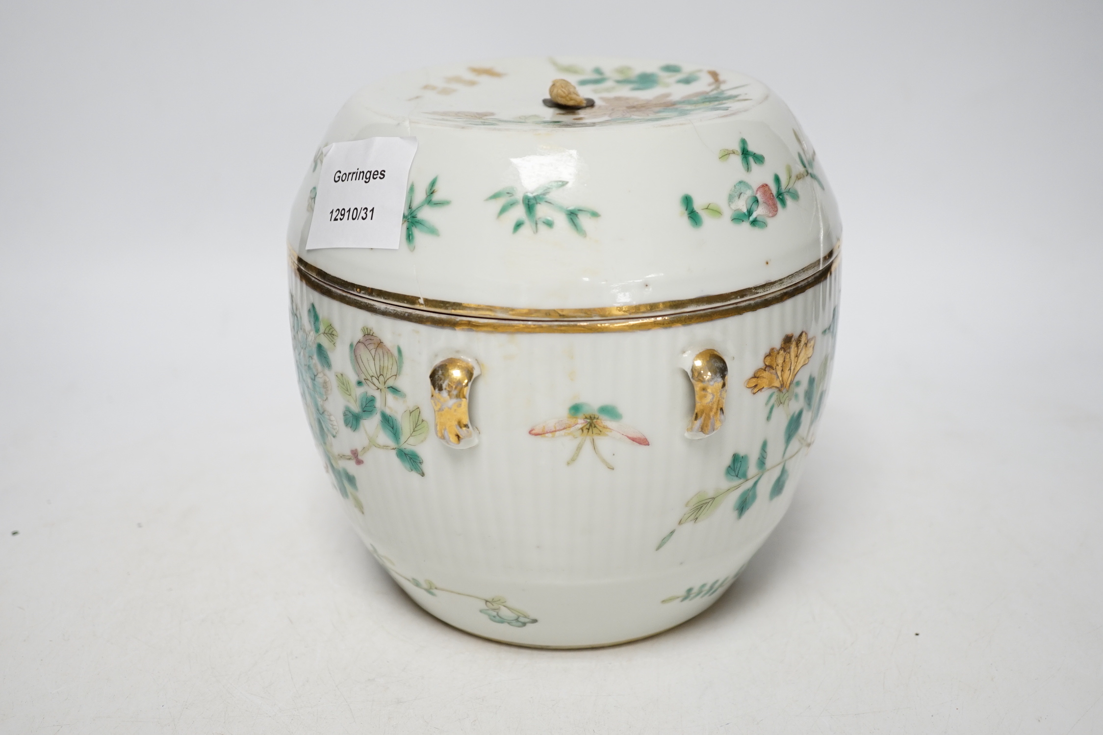 A Chinese enamelled porcelain barrel shaped jar and covered, 19th century, 16cm high